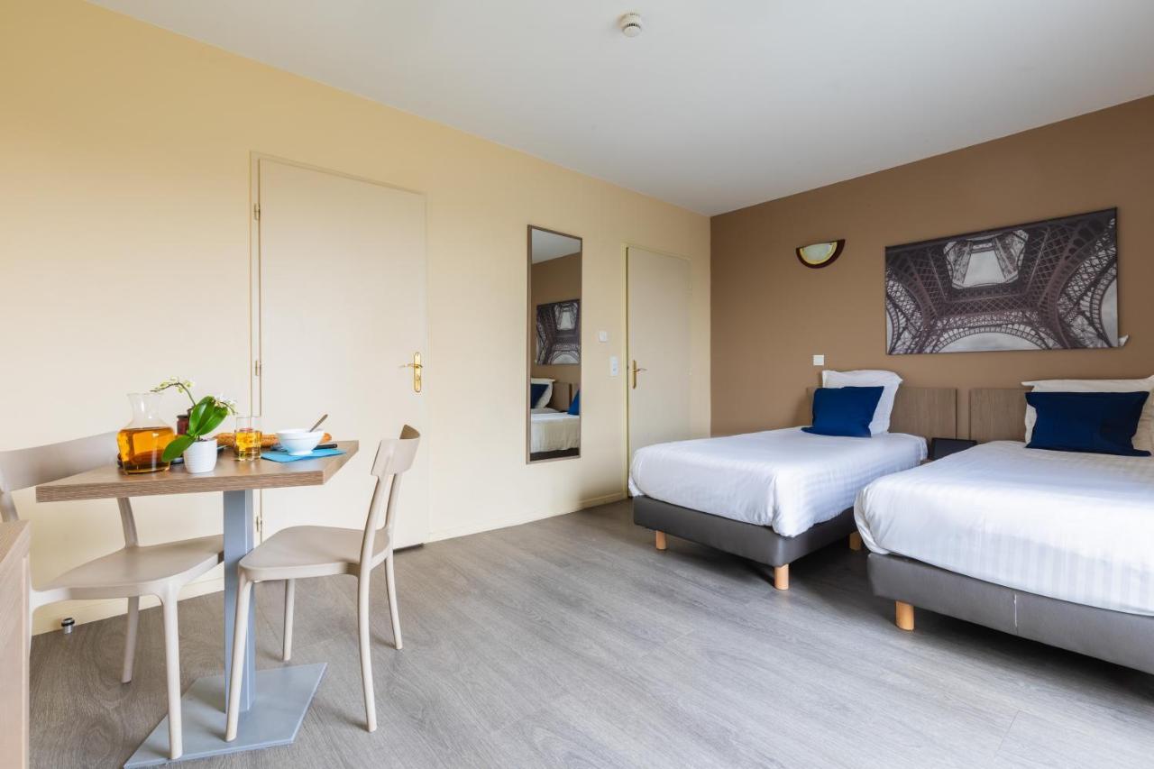 Zenitude Hotel-Residences Magny les Hameaux Bagian luar foto