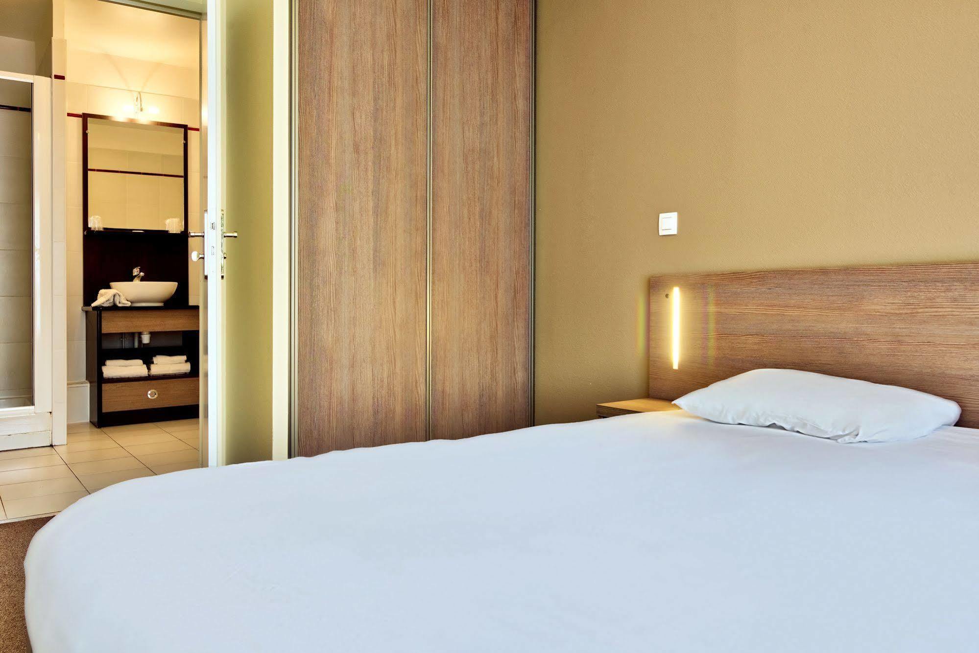 Zenitude Hotel-Residences Magny les Hameaux Bagian luar foto