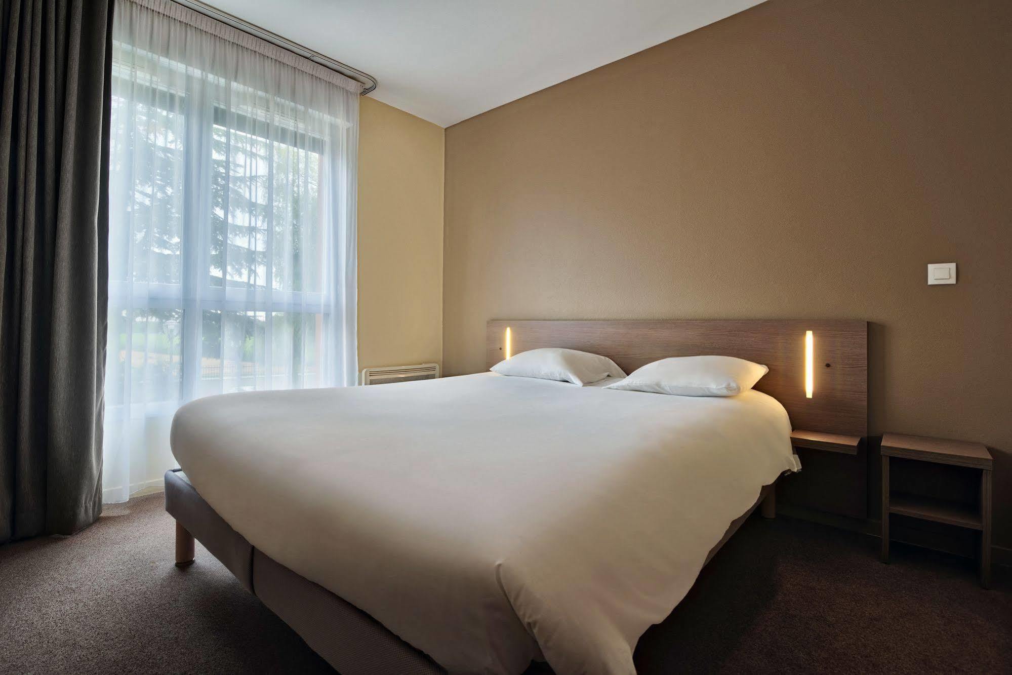 Zenitude Hotel-Residences Magny les Hameaux Bagian luar foto